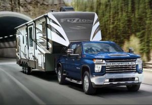 2023 Chevy silverado towing a fifth wheel trailer near Anderson, Indiana