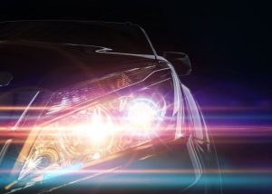 A car's headlights pointed at the camera near Anderson, Indiana.