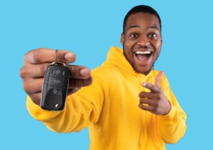 A person holding a set of car keys near Anderson, Indiana.