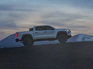 A 2024 Chevy Colorado driving up a hill near Anderson, Indiana