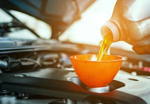 An oil change being performed at a service center near Anderson, Indiana