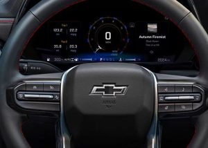 A steering wheel and display of a 2025 Chevrolet Colorado photographed near Anderson, Indiana
