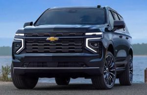 A front-facing 2025 Chevrolet Tahoe parked in front of a lake near Anderson, Indiana