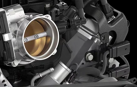 Close-up of the 2.7L TurboMax engine's throttle body and intake plumbing