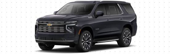 A dark grey Chevrolet Tahoe seen from a front three-quarter angle
