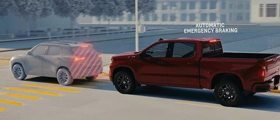 2026 Chevrolet Silverado 1500 using automatic emergency braking behind another vehicle